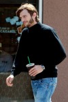 **EXCLUSIVE** Ashton Kutcher looks the spitting image of a young Steve Jobs as he grabs a coffee ahead of the start of filming his upcoming biopic on the late Apple honcho